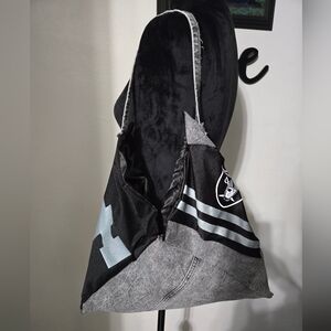 Black and Gray Raiders bag